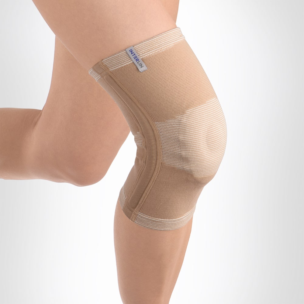 Бандаж на коленный сустав с силиконовым кольцом и ребрами жесткости